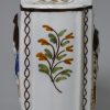 Pearlware pottery tea canister moulded with Macaroni figures and decorated with high fired enamels under the glaze, circa 1820