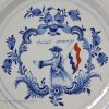 Dutch Delft charger decorated with a patriotic flag waving man, circa 1760