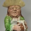 Ralph Wood type creamware pottery Toby jug decorated with coloured glazes, circa 1790