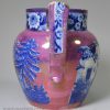 Pearlware pottery jug decorated with blue transfer under the glaze and pink lustre, circa 1820