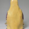 Buff coloured pottery fox head stirrup cup, circa 1820