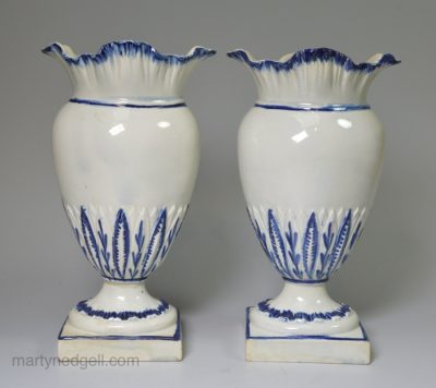 Pair of pearlware shell edge pottery pouch vases, circa 1800