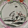 Creamware pottery plate decorated in Holland with the Dutch Maiden, circa 1780