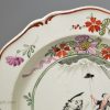 Creamware pottery plate decorated in Holland with the Dutch Maiden, circa 1780