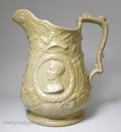 Drabware relief moulded jug commemorating Wellington, circa 1850