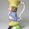 Staffordshire pearlware pottery jug moulded as John Liston in the part of Paul Pry, circa 1820