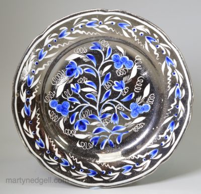 Pearlware pottery plate decorated with blue under the glaze and silver resist lustre, circa 1820