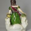 Pottery figure of a girl, circa 1830, probably Scottish
