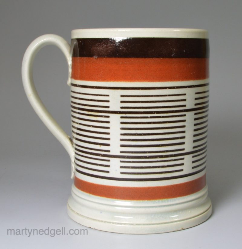 Pearlware mug with inlaid mocha decoration, circa 1820