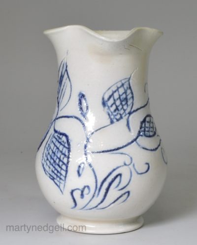 Small Staffordshire scratch blue decorated saltglaze jug, circa 1760