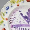 Pearlware pottery child's plate with lustre decoration, circa 1830