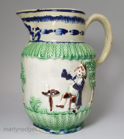 Pearlware pottery jug moulded with the Parson Clerk and Sexton, circa 1790, possibly one of the Wood family Potteries