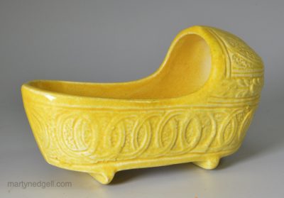 Canary yellow toy cradle, circa 1820