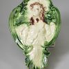 Creamware pottery plaque moulded with Flora and decorated with coloured glazes, circa 1780 possibly Bovey Tracey Pottery
