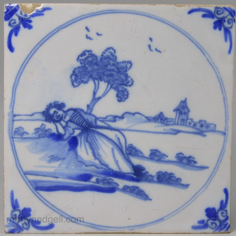 London delft tile painted with a sleeping lady in blue, circa 1750