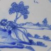 London delft tile painted with a sleeping lady in blue, circa 1750