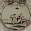 English creamware pottery plate decorated in Holland with the Dutch Maiden, circa 1780