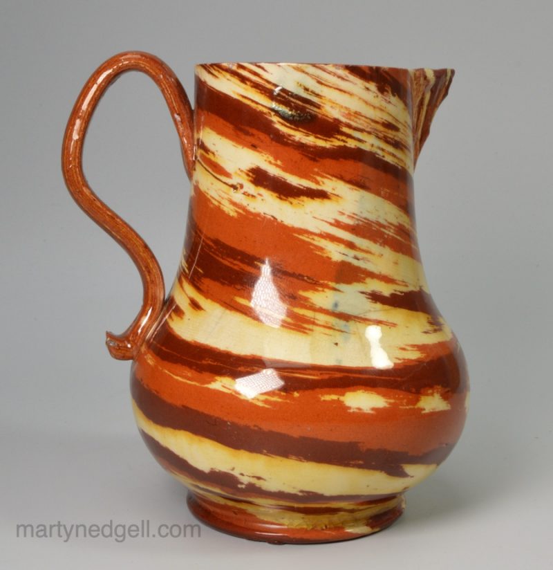 Staffordshire solid agateware jug, circa 1750
