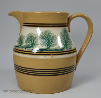 Mochaware yellow bodied pottery jug, circa 1850