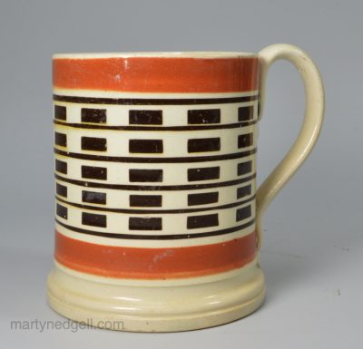 Pearlware pottery mug with inlaid mocha decoration, circa 1820
