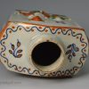 Pearlware pottery tea canister moulded with Macaroni figures and decorated with high fired enamels under the glaze, circa 1820
