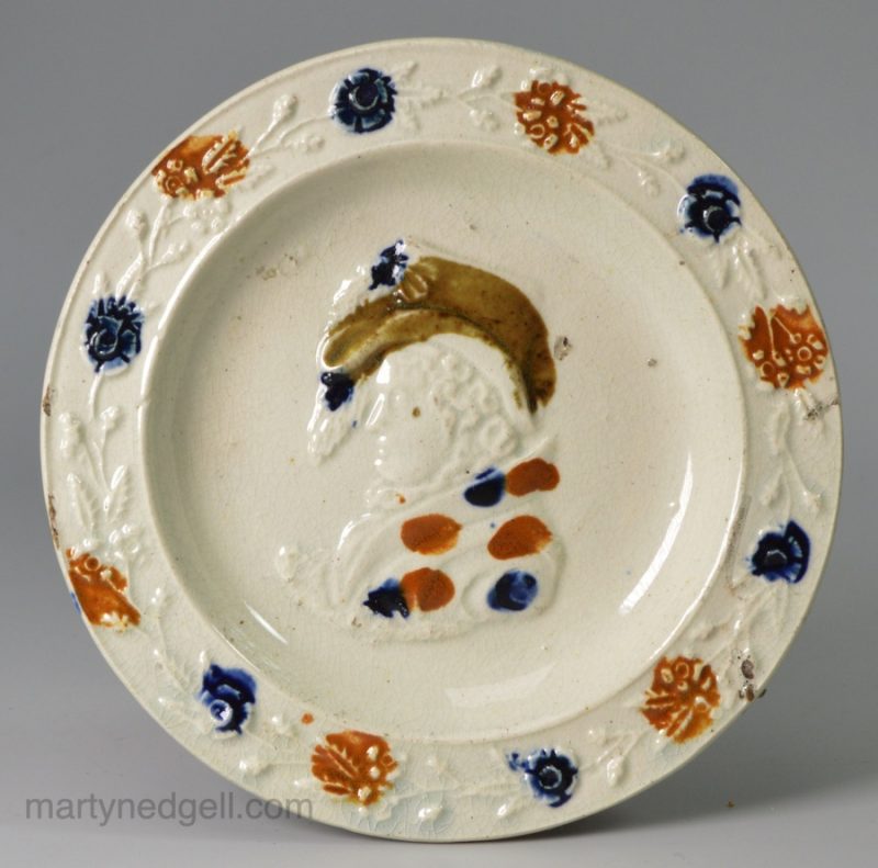 Small prattware plate commemorating Queen Caroline, circa 1821
