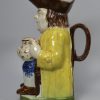 Pearlware pottery Toby jug decorated with high fired enamels under the glaze, circa 1820