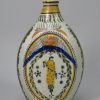 Prattware pottery flask moulded with classical figures, circa 1820