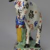 Yorkshire type prattware pottery cow and attendant, circa 1820
