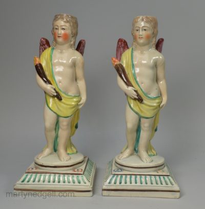 Staffordshire pearlware figural candlesticks, circa 1820