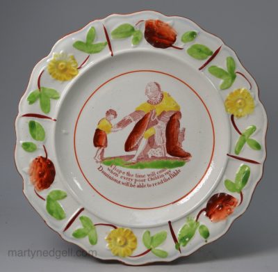 Pearlware pottery child's plate George III giving a bible to a child, circa 1820