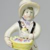 Staffordshire pearlware pottery figure of a fruit seller, circa 1820, Walton Pottery