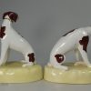 Pair of Staffordshire porcelain dismal hounds, circa 1840