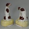 Pair of Staffordshire porcelain dismal hounds, circa 1840