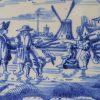 Dutch Delft tile painted with canal ice skaters, circa 1750