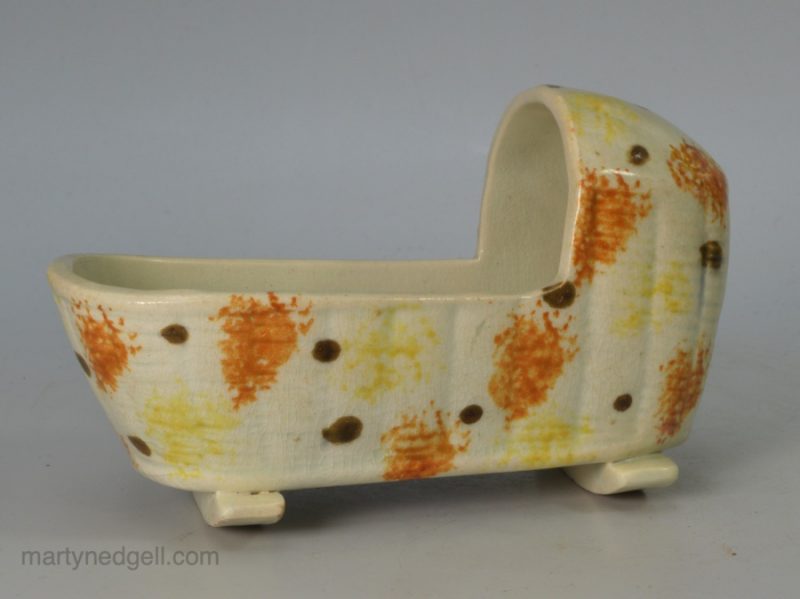 Prattware pottery toy cradle, circa 1820