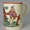 Creamware pottery mug decorated with a coloured print, dated 1770
