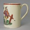 Creamware pottery mug decorated with a coloured print, dated 1770