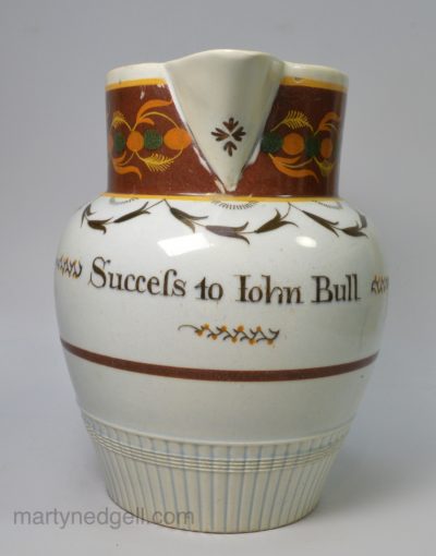 Pearlware pottery jug decorated with enamels under the glaze "Success to John Bull", circa 1810