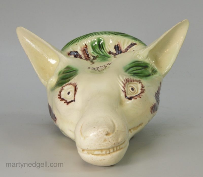 Creamware pottery fox head stirrup cup, circa 1780