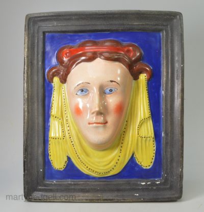 Pearlware pottery plaque moulded as a Roman lady, circa 1820