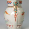 Japanese porcelain jug moulded in a style of Prattware pottery but decorated in traditional Japanese style, circa 1800
