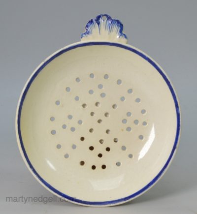 Creamware pottery egg strainer, circa 1800