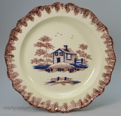 Creamware pottery plate with manganese and blue decoration, circa 1790