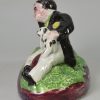 Pearlware pottery boy with his dog, circa 1820 Scottish Pottery