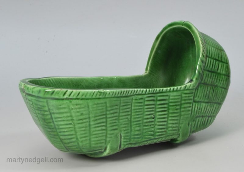 Green glazed pottery toy cradle, circa 1820
