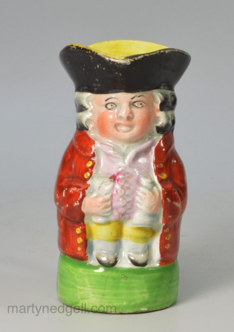 Small pearlware pottery Toby jug, circa 1820