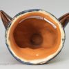 English buff coloured pottery stirrup cup, circa 1820