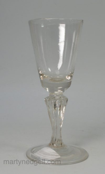 Continental soda wine glass with a Silesian stem and folded foot, circa 1750
