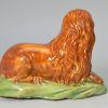 Pearlware pottery lion decorated with colours under the glaze, circa 1800